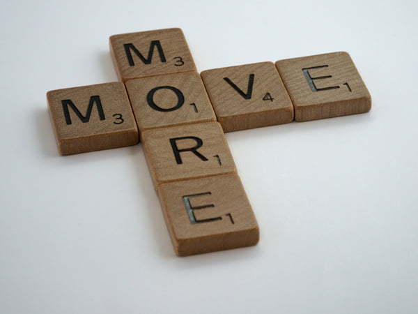 Move more in Holzbuchstaben